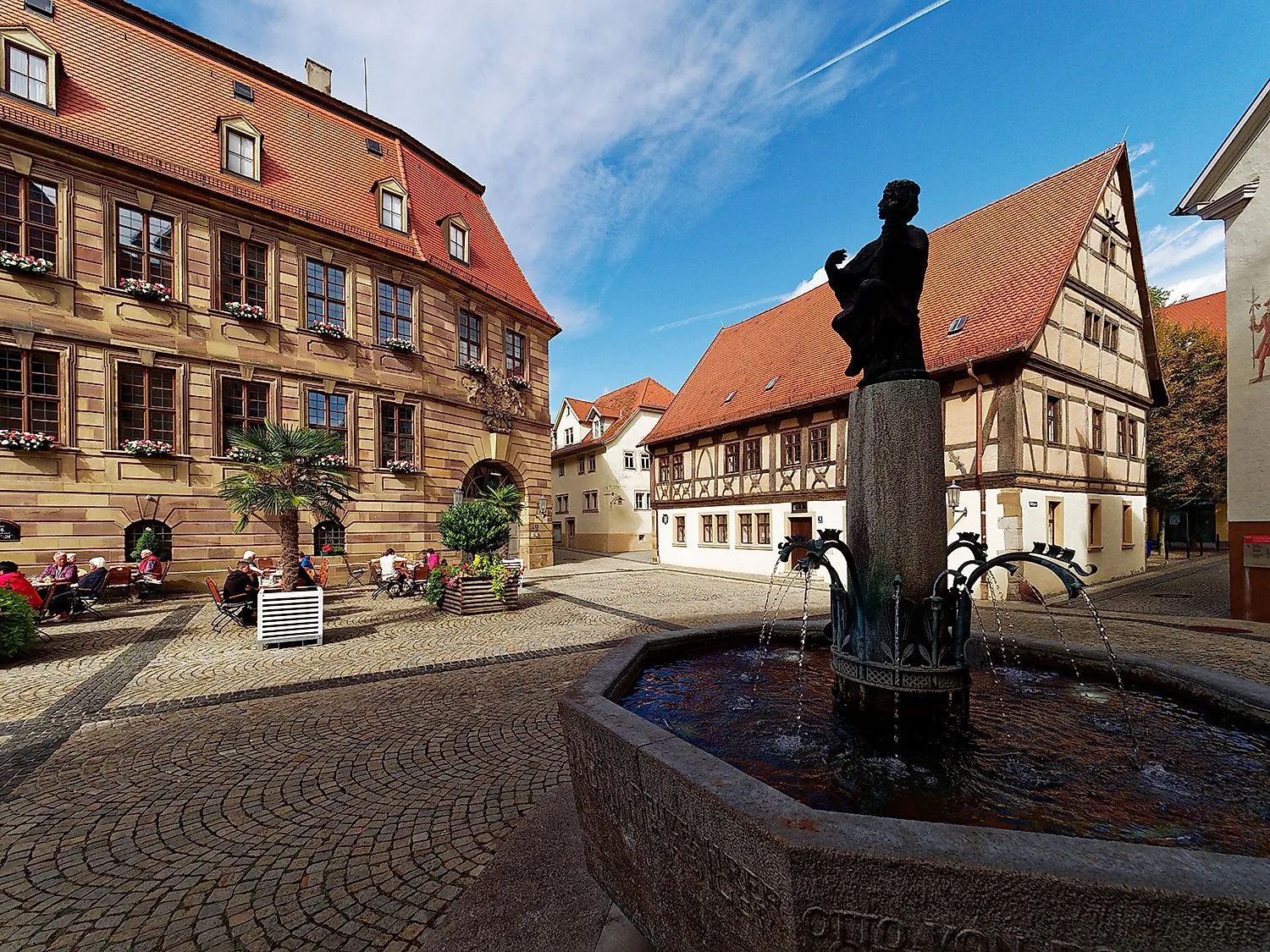 Bad Kissingen town hall square with Otto von Bismarck fountain and half-timbered houses