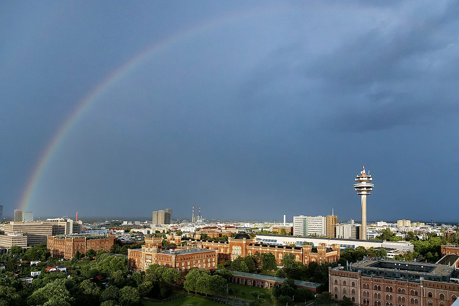 View over Vienna with Danube Tower, rainbow and city panorama