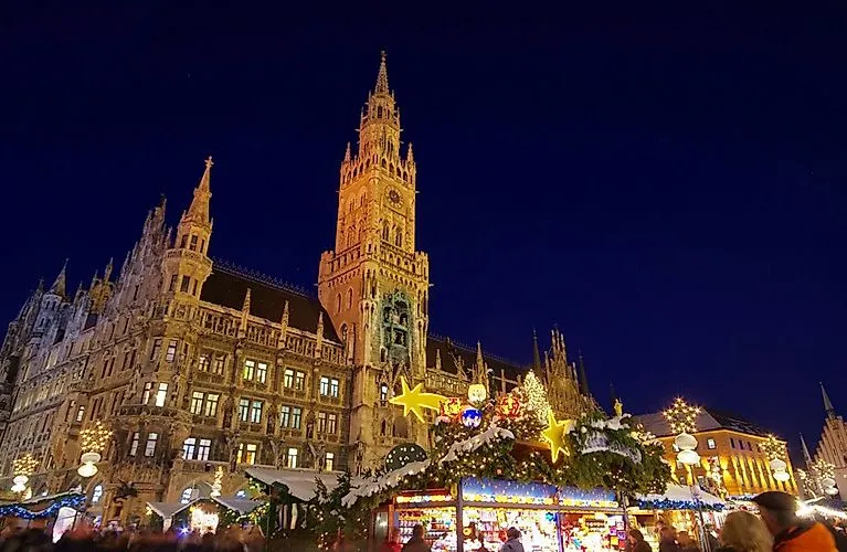 Christmas market on Marienplatz at night with festive lighting