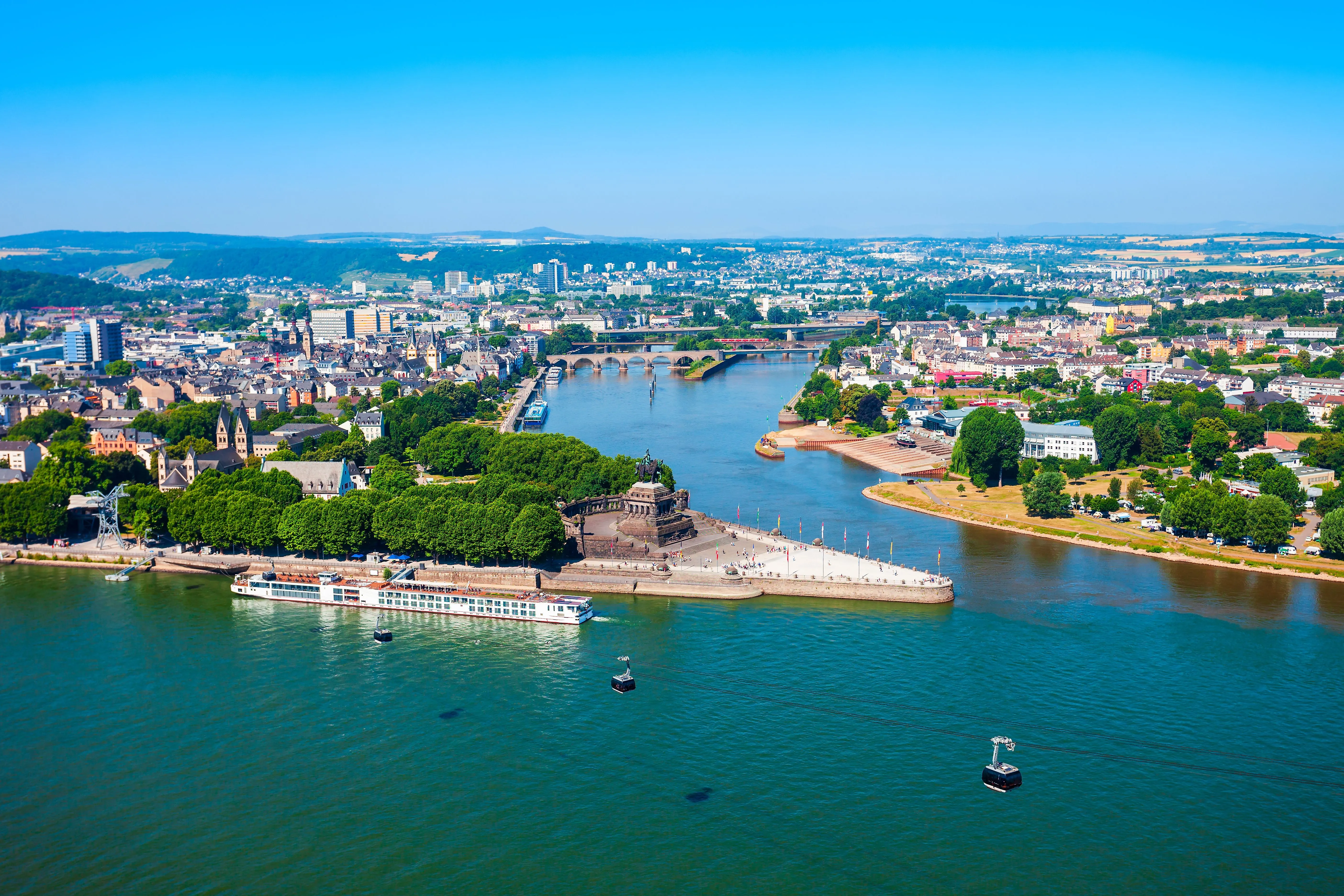 Aerial view of Koblenz with the Deutsches Eck and the confluence of the Rhine and Moselle rivers.