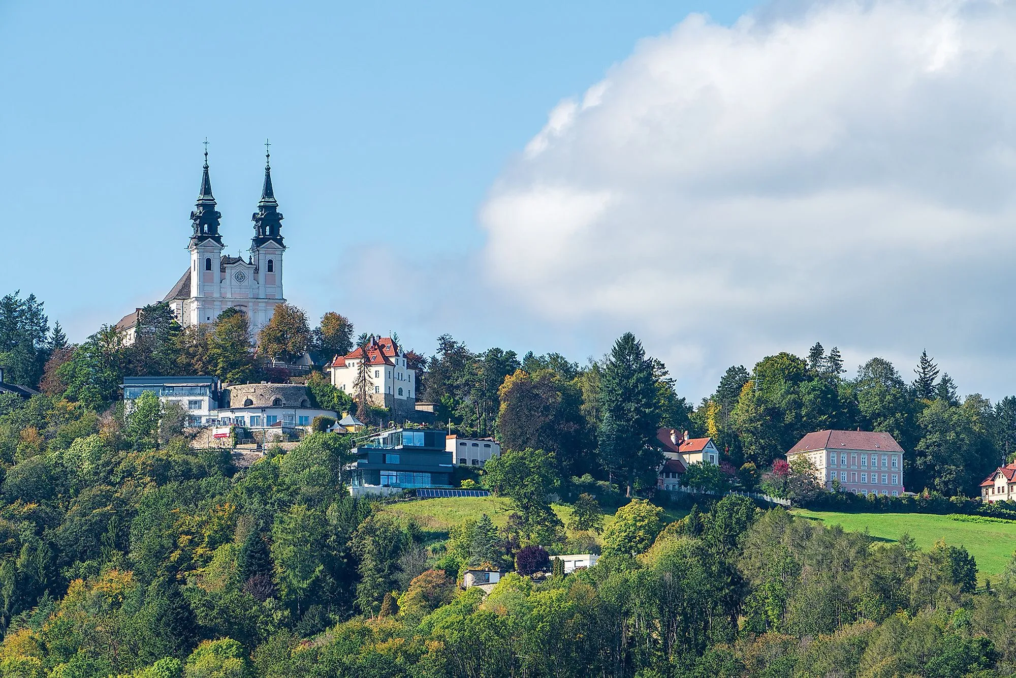 View of the Pöstlingberg with pilgrimage basilica and green surroundings in Linz