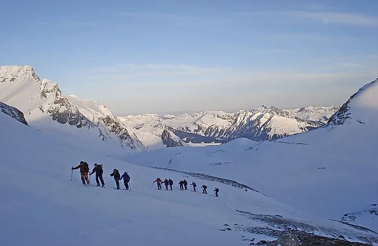 Ski tour through a snowy landscape near Lenk in the Simmental in Switzerland