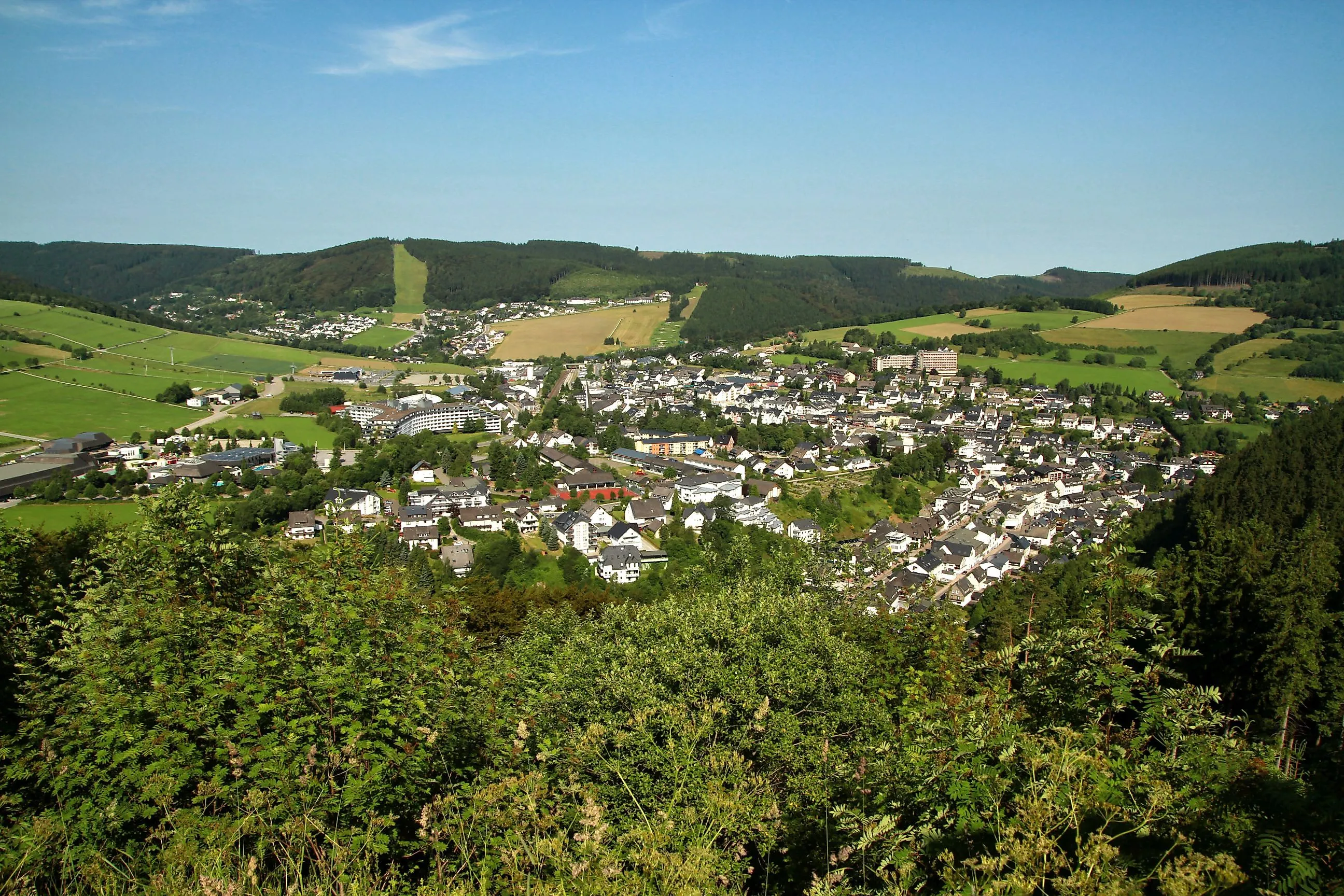 Panoramic shot of Willingen in summer, taken from the Orenberg - with a view of the green Upland and the typical low mountain range landscape.